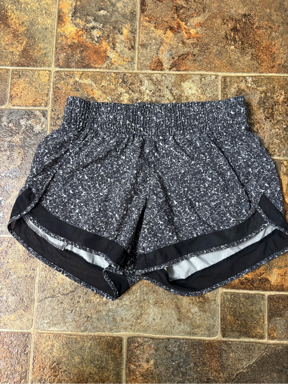 Athleta Black Flecked Running Shorts with Black Trim